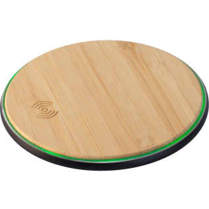 A round bamboo wireless charger with a black circular edge and a glowing green outline.