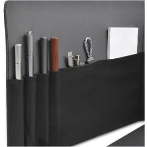A black laptop bag featuring multiple compartments for pens, USB drives, and a notepad, with an integrated branding logo.