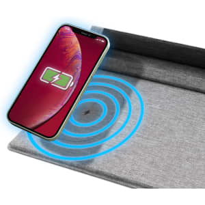 A grey mouse pad with wireless charging capability, featuring a phone displaying a charging icon above it.