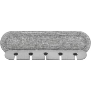 A grey Cabledock Eco Cable Organiser with multiple slots for tidy cable management. Features branding.