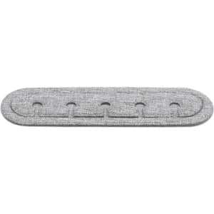 A grey cable organiser made from RPET material featuring multiple slots for holding cables. It has a simple, textured design.