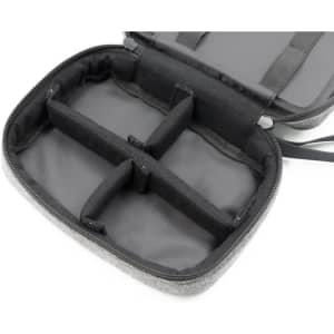 A grey toiletry bag featuring multiple compartments, with a zippered closure and an interior lining.