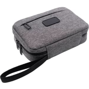 A grey toiletry bag with a zip closure and a convenient handle, featuring a sleek design.