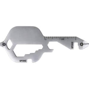 A silver multi-tool featuring a key shape, with various measurement markings and a brand logo.