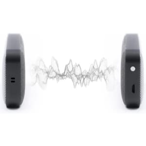 A pair of black Nano Vegan Wireless Speakers with sound waves visually represented between them.