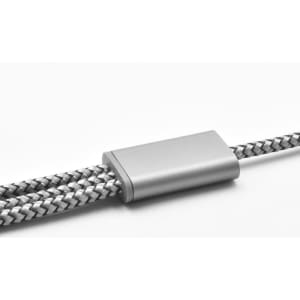 A charging cable with a silver metal connector and a braided grey and black design, featuring a logo.