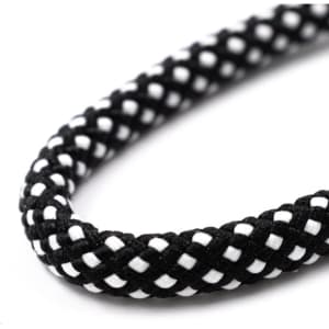 A black and white braided strap with a textured finish, designed for crossbody use with phones.