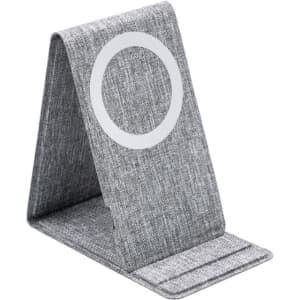 A grey wireless charger with a textured fabric design and a circular charging pad.