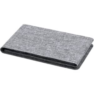 A grey fabric wallet with a simple, minimalist design, featuring a fold-over style.