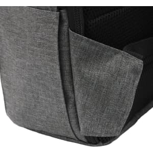 A grey computer backpack featuring a textured surface and a side pocket, with a logo on the front.