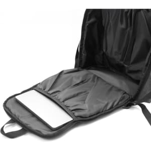 A black computer backpack with a padded compartment and multiple storage pockets, featuring a logo.