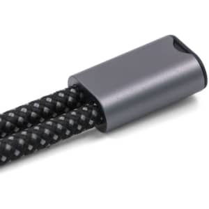 A black and grey braided wristband strap with a metallic grey connector, featuring a logo.