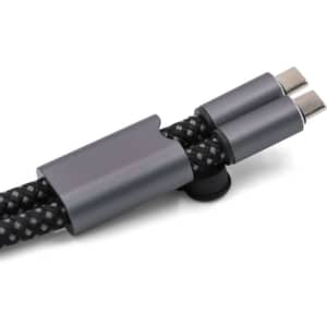 A charging cable with dual connectors, featuring a black braided design and a metallic grey holder.