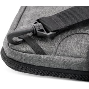 A grey laptop case featuring a zipper and a strap clip. It has a sleek, textured design.