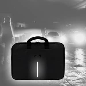A black laptop case with a handle and a reflective strip, set against a blurred nighttime background.