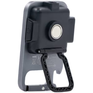A black and grey multi-tool with a handle, featuring a button and a magnet on the back. It has a logo present.