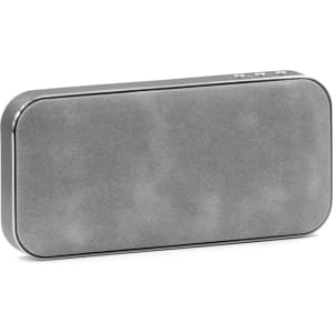 A grey Bluetooth speaker powerbank with a sleek design and a logo on one side.