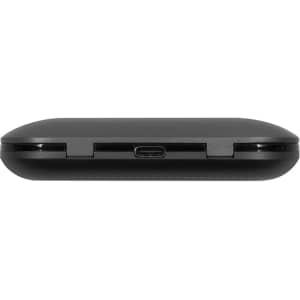 A black charging case for true wireless earbuds featuring a USB-C port. The case has a smooth, rounded design and a branding logo.