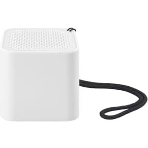 A square, white portable speaker with a textured top and a black strap. It features a simple design and has branding.