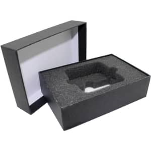 A two-part black gift box with an inner foam insert, designed for secure packaging. It has a sleek, minimalist appearance.