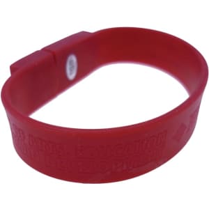 A red silicone wristband with a logo, featuring embossed text. The band is flexible and suitable for events.