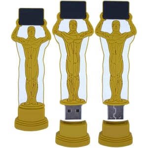 Custom moulded flash drives in gold, shaped like a figure holding a rectangular base, featuring a logo on the front.