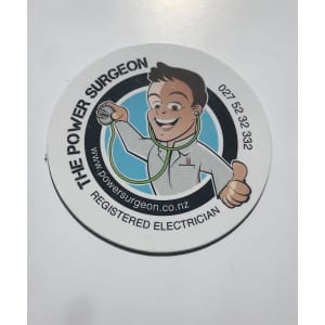 A circular fridge magnet featuring a cartoon electrician in a white lab coat with a stethoscope.