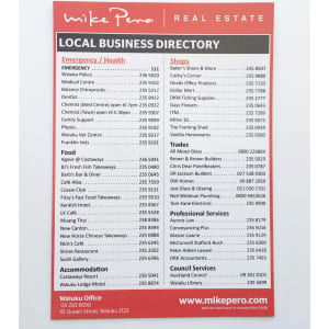 A5 fridge magnet in red with a local business directory, featuring various services and a logo at the top.