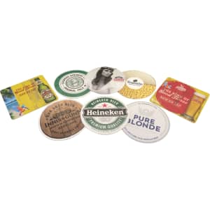 A collection of circular cardboard drink coasters in various designs and colours, featuring different beer brands and logos.