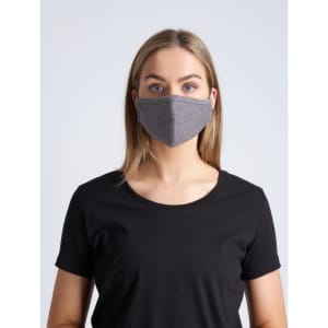 A grey, two-layer face mask is worn by a model with long hair, paired with a black t-shirt.