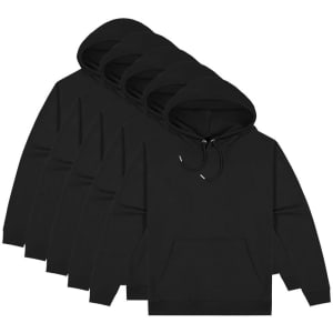 A collection of black hoodies stacked in a row, featuring a front pocket and a drawstring hood.
