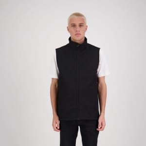 A black softshell vest for men, featuring a zip front and a logo. Model is wearing it over a white shirt.