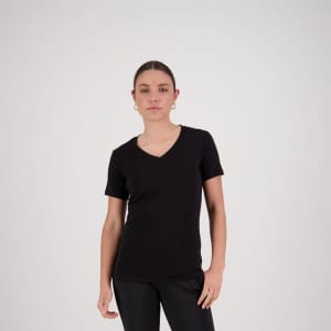 A black women's V-neck tee, fitted and made from soft fabric, displayed by a model in a neutral backdrop.