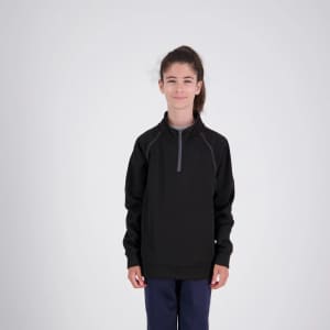 A girl wearing a black XT Performance Drill Top, featuring a zip collar and a logo.