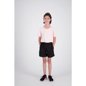 A pair of black sports shorts for kids, worn with a light pink T-shirt. The shorts have an elastic waistband.