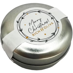 A silver tin featuring a festive label, containing chewy mints, elegantly designed for Christmas.