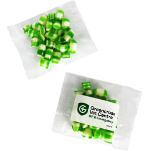 A pack of green and white humbug sweets, featuring a logo. Suitable for promotional confectionery.