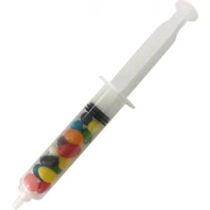 A syringe filled with colourful mini jelly beans, showcasing various vibrant hues in a clear plastic casing.