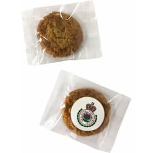 Mixed biscuits individually wrapped in clear cellophane, featuring a light brown colour and a logo on one pack.