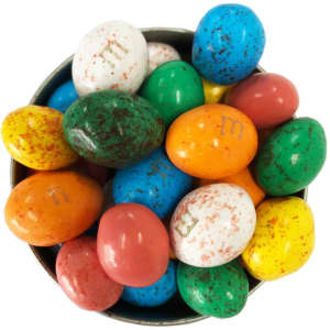 A bowl filled with various colourful chocolate eggs in shades of blue, green, red, yellow, and white, featuring a logo.