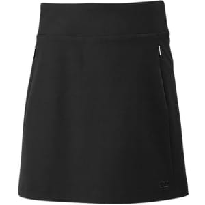 A black skort featuring a fitted waistband and side zip pockets, with a logo on the hem.