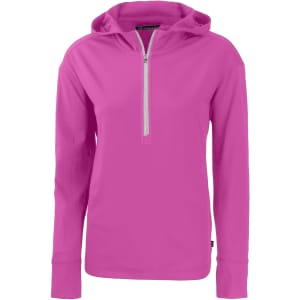 A pink half-zip hoodie with a hood and long sleeves, featuring a logo on the front.