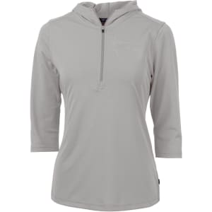 A light grey half-zip jacket for ladies, featuring a hood and three-quarter sleeves. It has a logo on it.