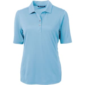 A light blue ladies polo shirt with a collar, short sleeves, and a buttoned placket. It features a logo.