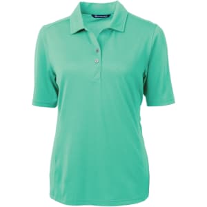 A mint green ladies' polo shirt featuring a collar and short sleeves, with a logo on the chest.