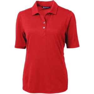 A red ladies' polo shirt with short sleeves, a collar, and three buttons. It features a logo on the chest area.