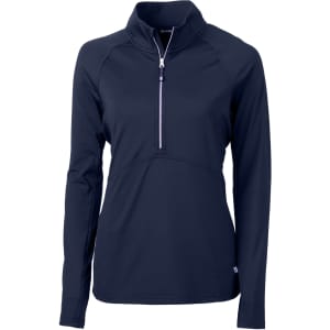 A navy half-zip jacket with long sleeves and a zippered collar. Features a small logo on the hem.