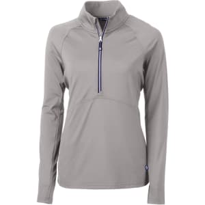 A grey ladies' half zip jacket featuring long sleeves and a branded logo.