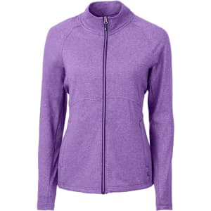 A purple full zip jacket designed for women, featuring a slim fit and a logo on the sleeve.