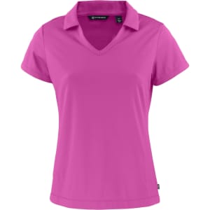 A pink ladies polo shirt with a V-neck and a collar, featuring a logo on the label.